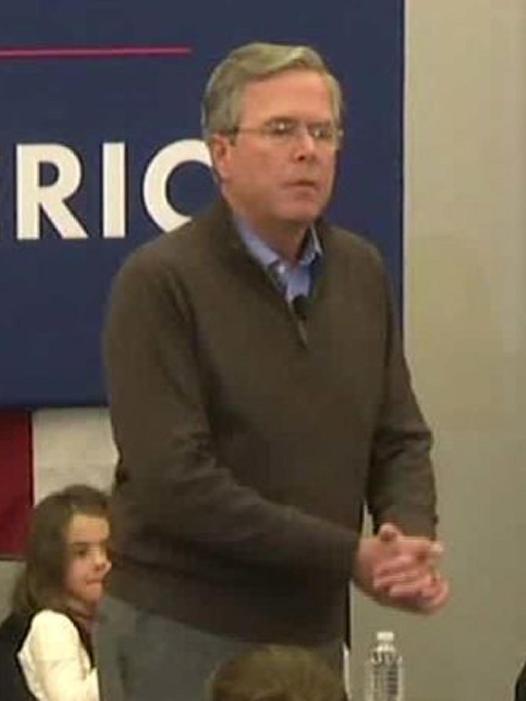 A photo of Jeb Bush after commanding a campaign crowd to "please clap"